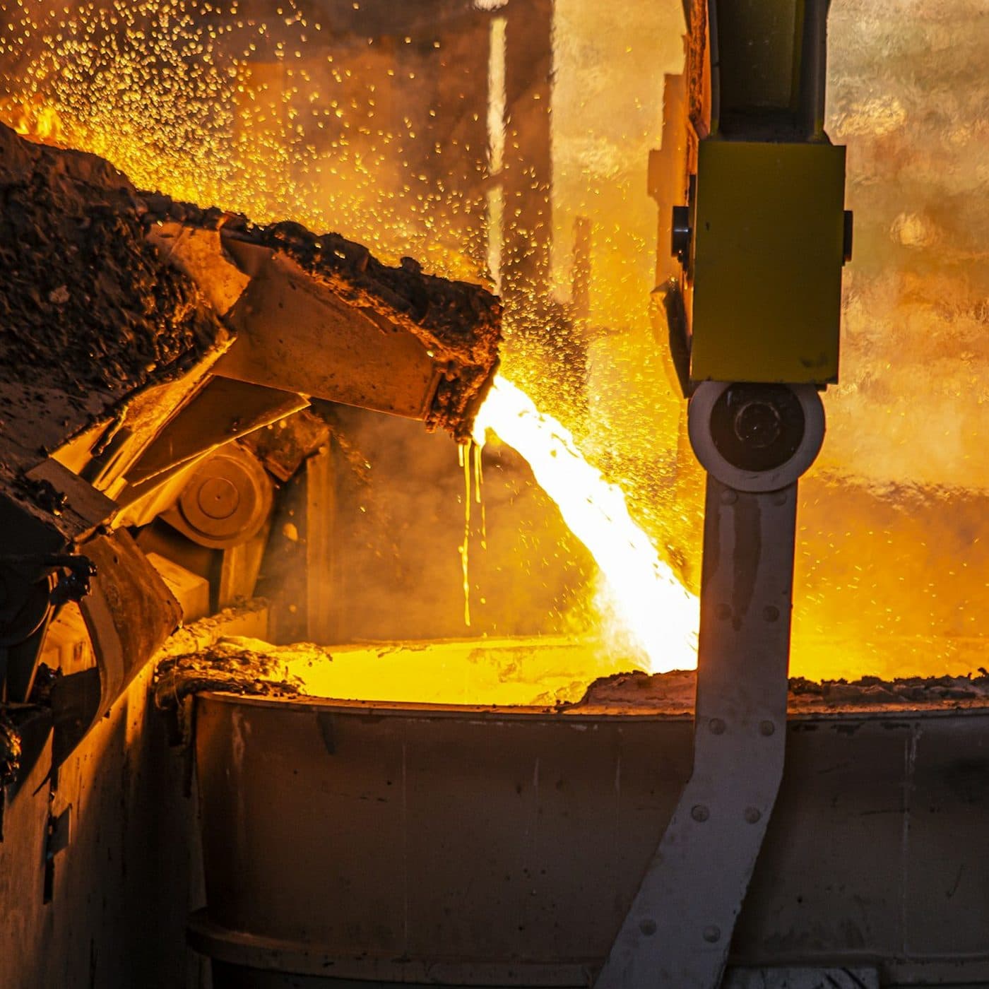 Molten metal pouring from a smelting furnace